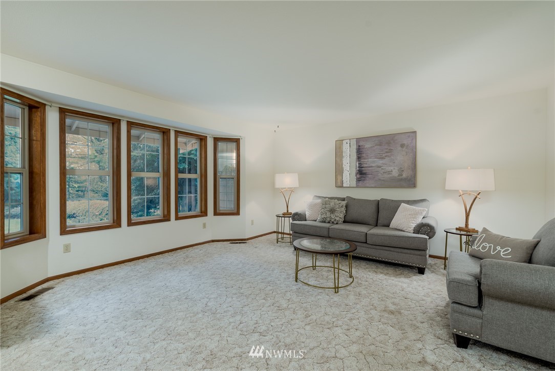 6507 Woodlyn Road Ferndale, WA 98248 - Photo 3 of 25 a living room with furniture and a large window