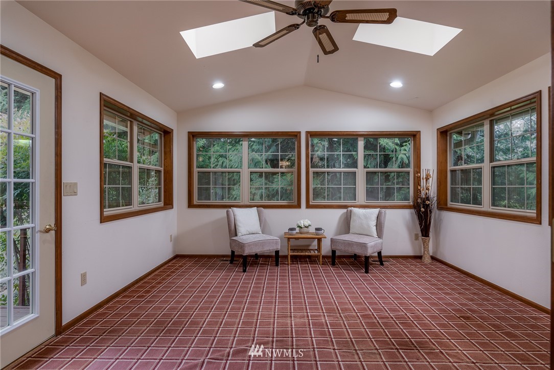 6507 Woodlyn Road Ferndale, WA 98248 - Photo 8 of 25 a living room with furniture and large windows