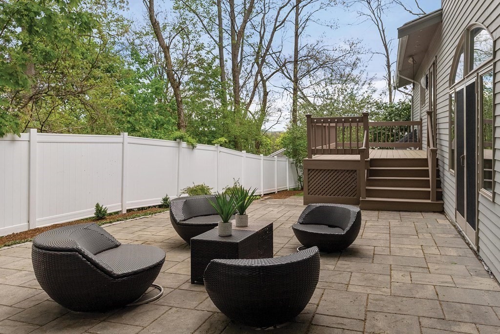 43 Ober Road Newton, MA 02459 - Photo 14 of 16 a view of a patio with couple of chairs and a potted plant