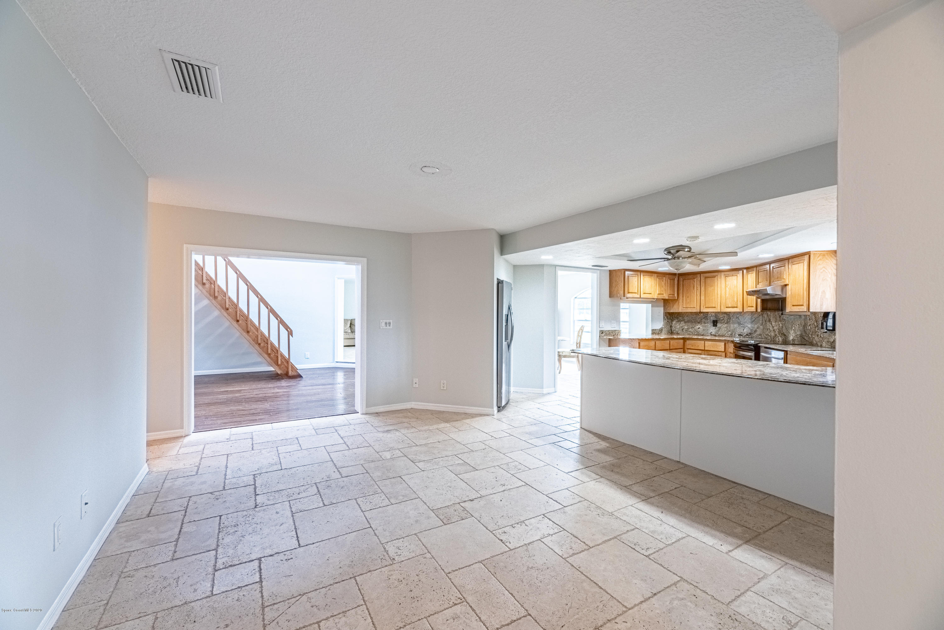 4300 Pinewood Road Melbourne, FL 32934 - Photo 21 of 60 a view of a kitchen with windows