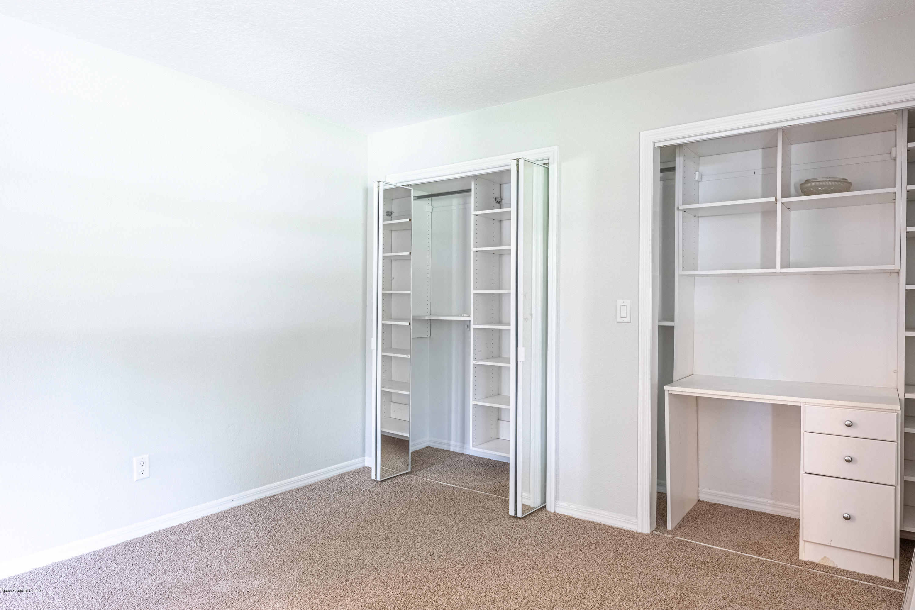 4300 Pinewood Road Melbourne, FL 32934 - Photo 33 of 60 a view of an empty room with cabinet