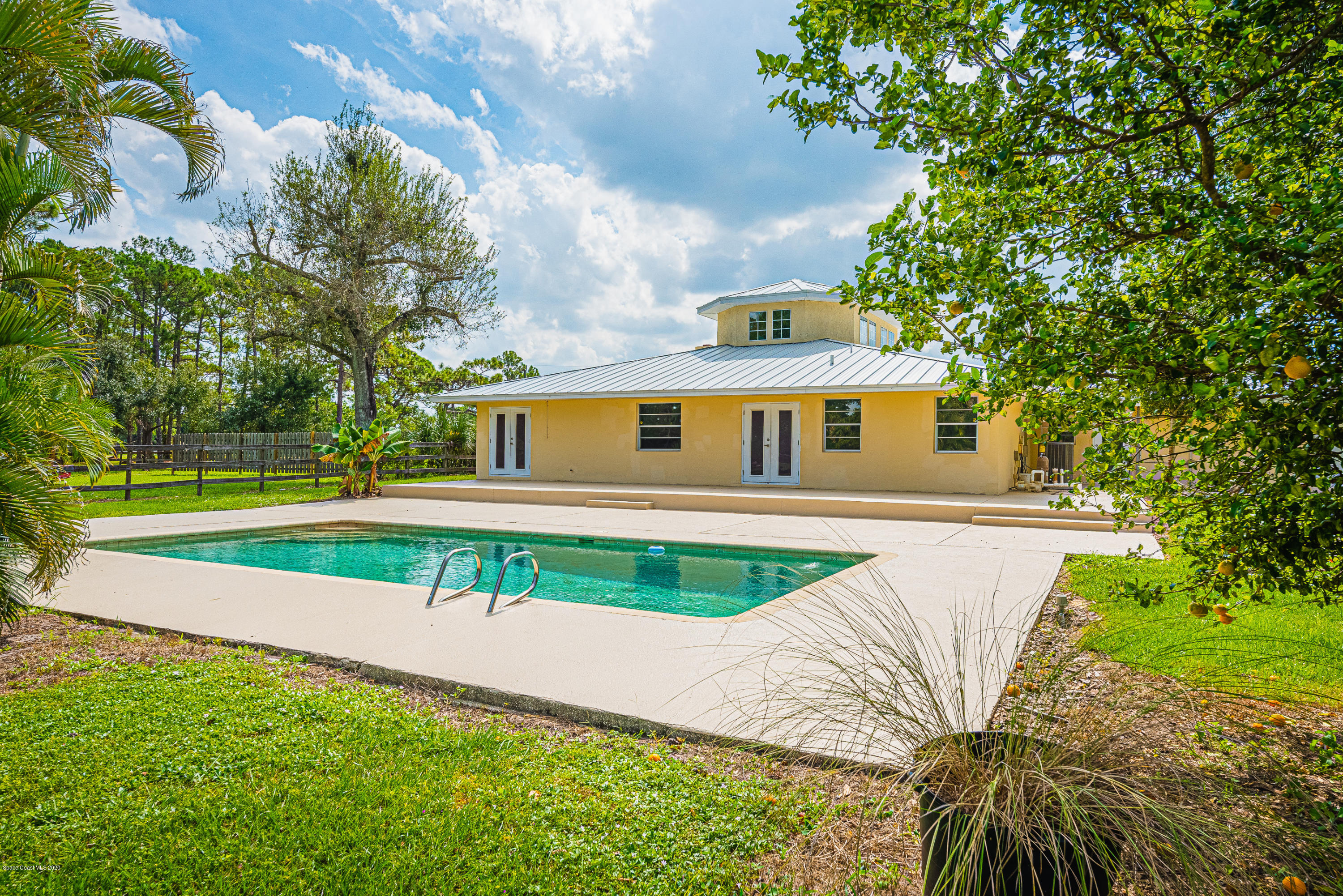 4300 Pinewood Road Melbourne, FL 32934 - Photo 6 of 60 a view of pool with a yard