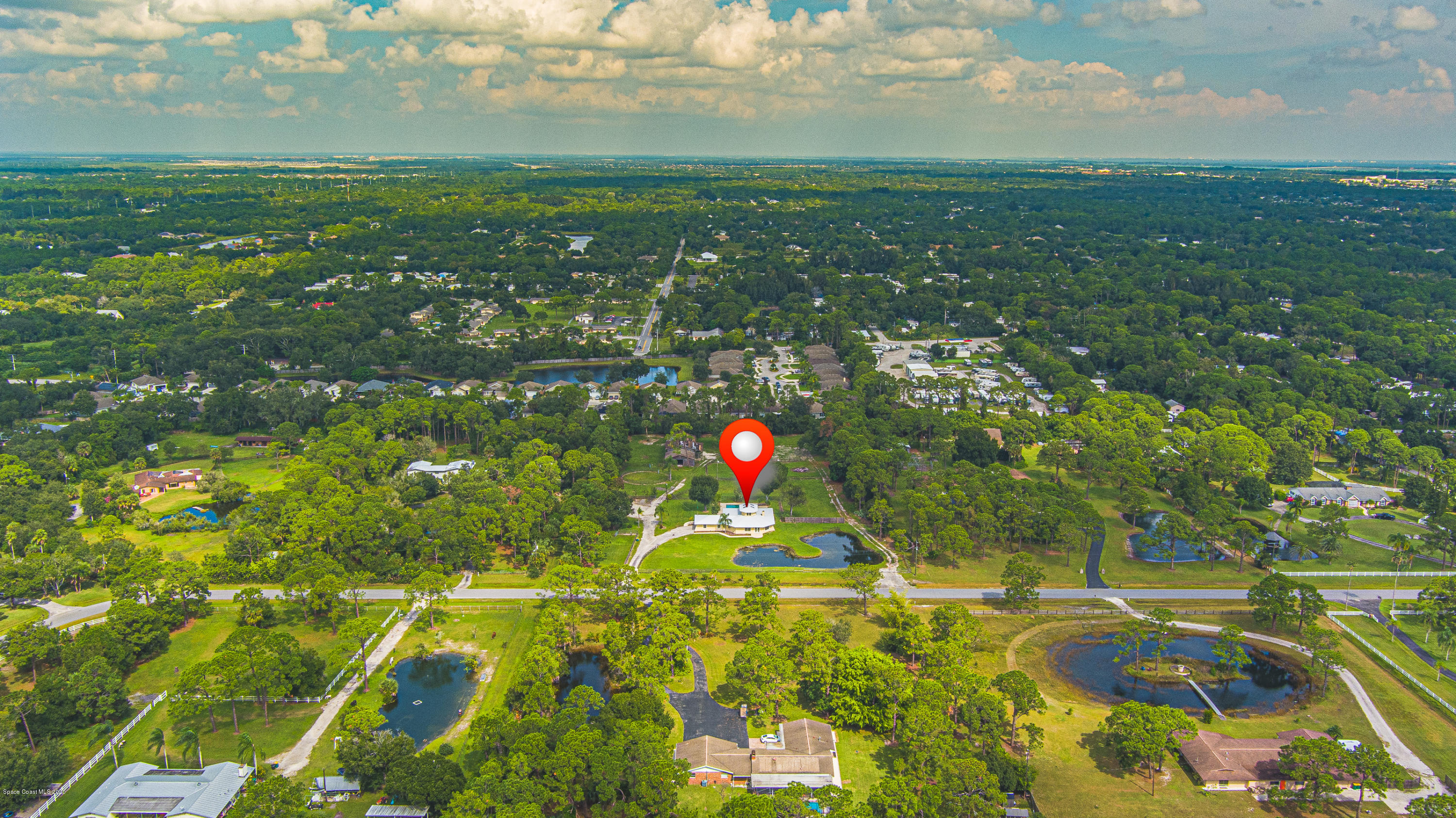 4300 Pinewood Road Melbourne, FL 32934 - Photo 54 of 60 a view of a tennis court