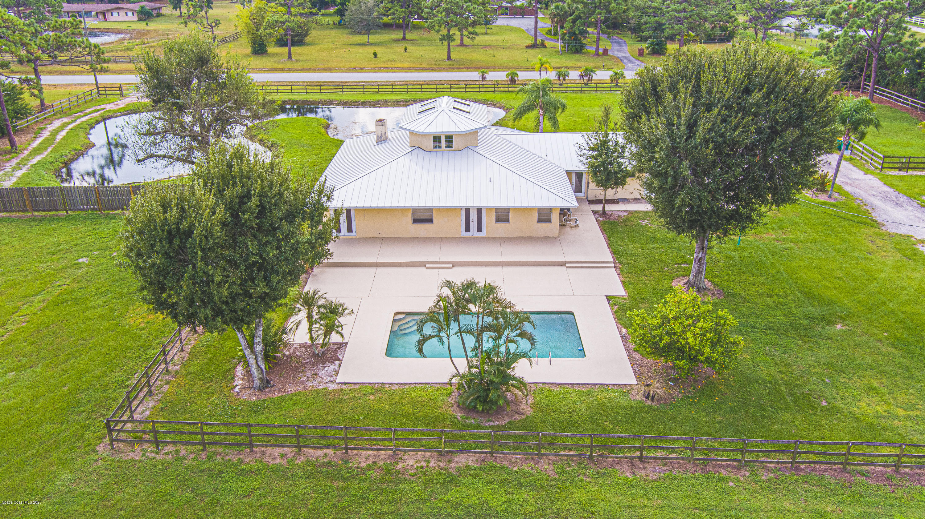 4300 Pinewood Road Melbourne, FL 32934 - Photo 60 of 60 a view of a house with a yard