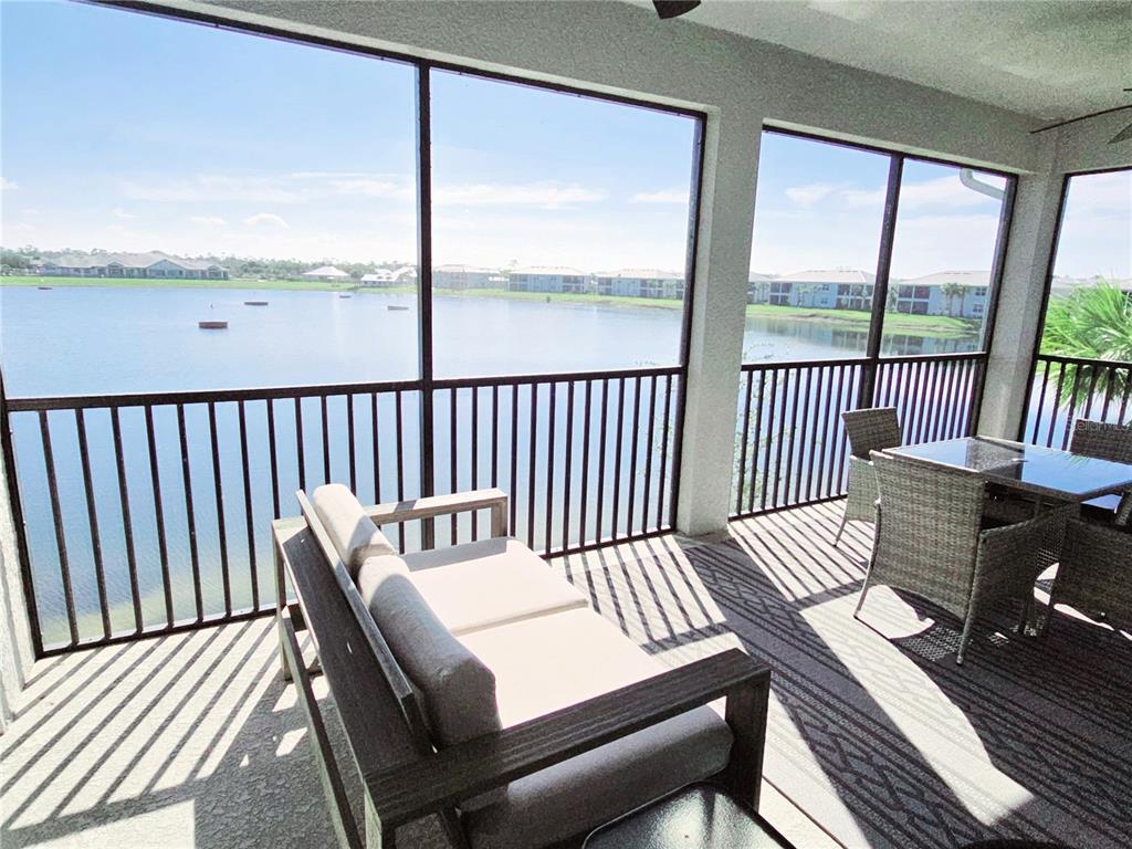 14132 Poppy Fld Loop, Unit 4022 Punta Gorda, FL 33955 - Photo 11 of 17 a view of a chairs in balcony