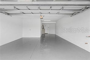 14132 Poppy Fld Loop, Unit 4022 Punta Gorda, FL 33955 - Photo 14 of 17 a view of a room with racks on the wall