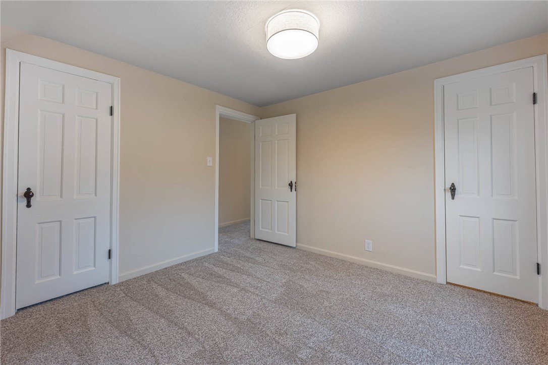 1012 Hampshire Road Dayton, OH 45419 - Photo 30 of 39 This inviting bedroom features neutral tones and soft carpeting, perfect for peaceful living.