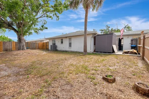 a view of a backyard of a house