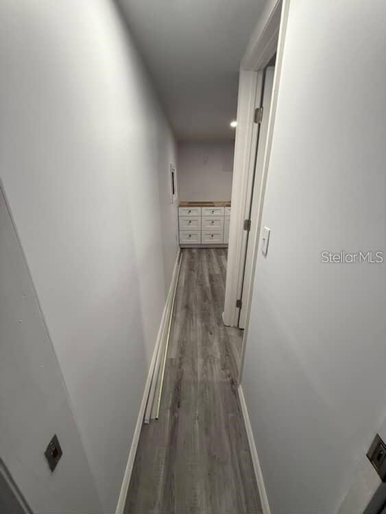 5500 North Rome Avenue, Unit 29 Tampa, FL 33603 - Photo 4 of 10 a view of a hallway with wooden floor and staircase