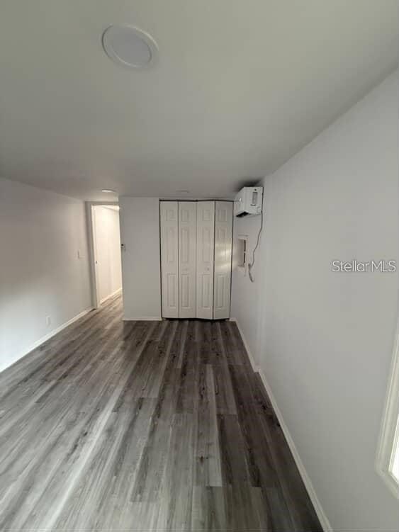 5500 North Rome Avenue, Unit 29 Tampa, FL 33603 - Photo 7 of 10 a view of a room with wooden floor and window