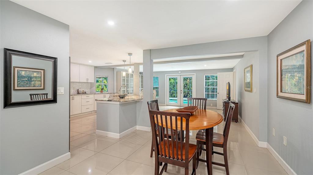 1523 84th Street Northwest Bradenton, FL 34209 - Photo 7 of 48 a dining room with furniture and window