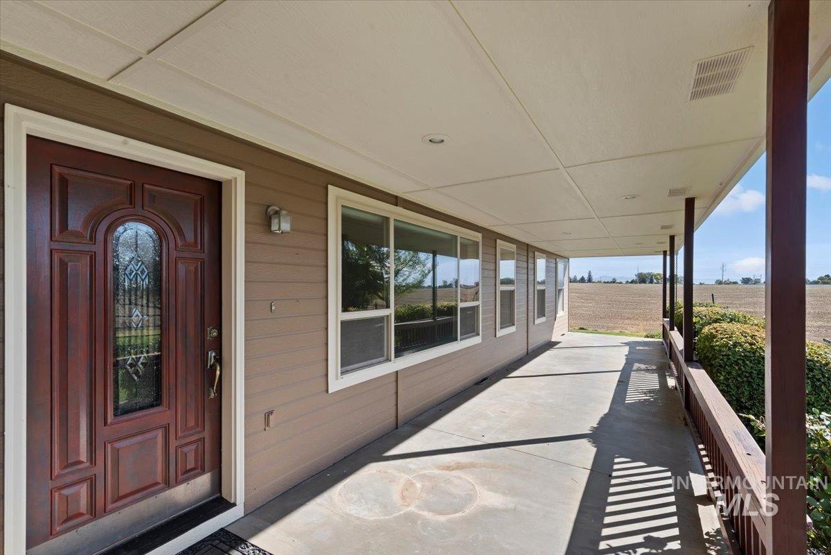 24240 Tiger Lane Caldwell, ID 83607 - Photo 3 of 50 Covered front porch with recessed lighting
