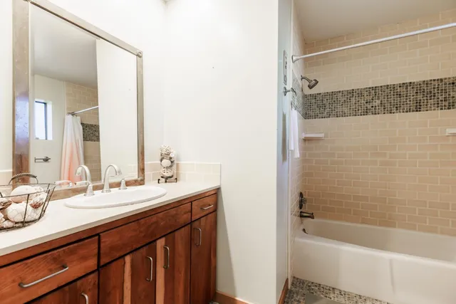 a bedroom with a bed and a closet