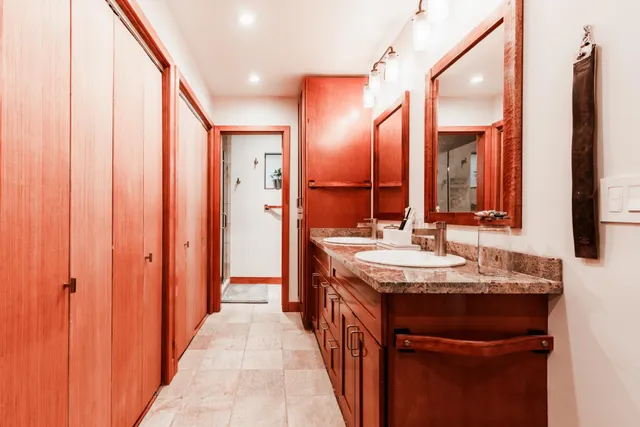 a bedroom with a bed and tv