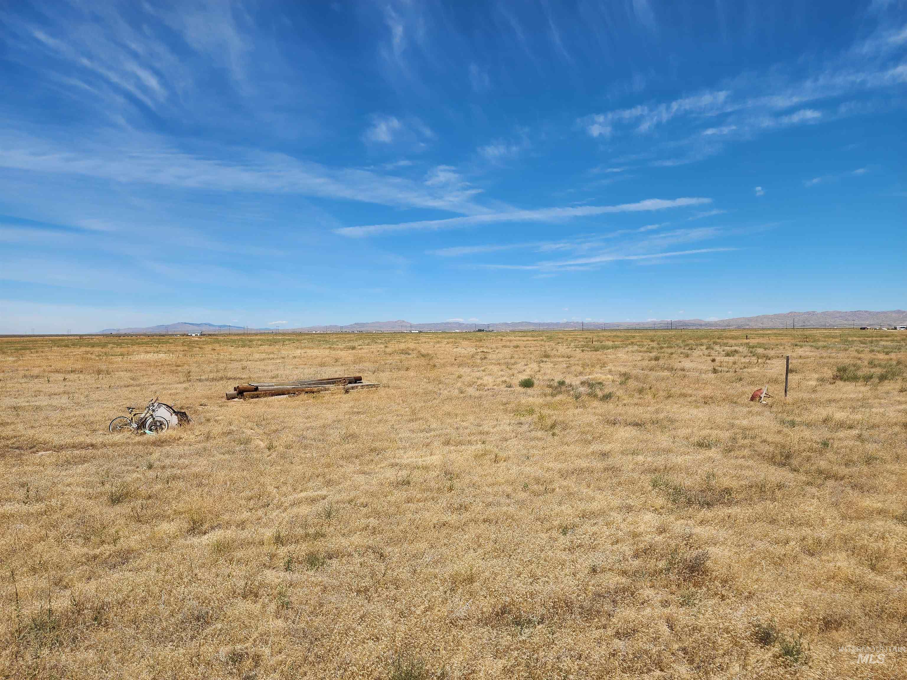 Tbd South Simco Road Mountain Home, ID 83647 - Photo 3 of 4 View of yard featuring a view of rural / pastoral area and a mountain view