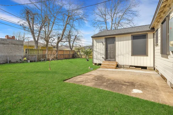 a view of a backyard with a garden