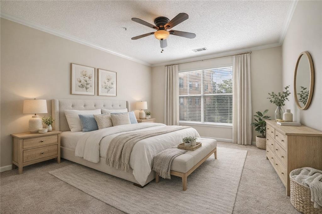 10 Perimeter Summit Boulevard, Unit 3206 Atlanta, GA 30319 - Photo 13 of 35 a spacious bedroom with a bed and a chandelier