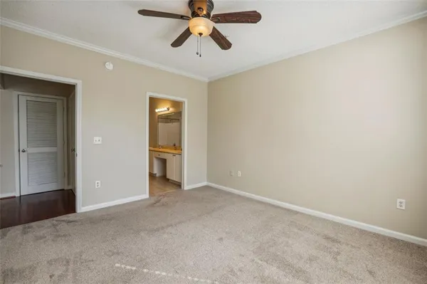 a view of an empty room and window