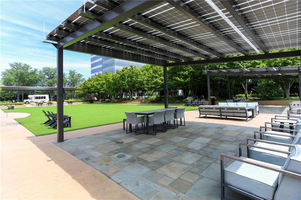 10 Perimeter Summit Boulevard, Unit 3206 Atlanta, GA 30319 - Photo 31 of 35 a view of a backyard with sitting area
