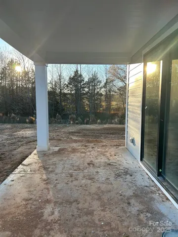 a view of a room with a large window