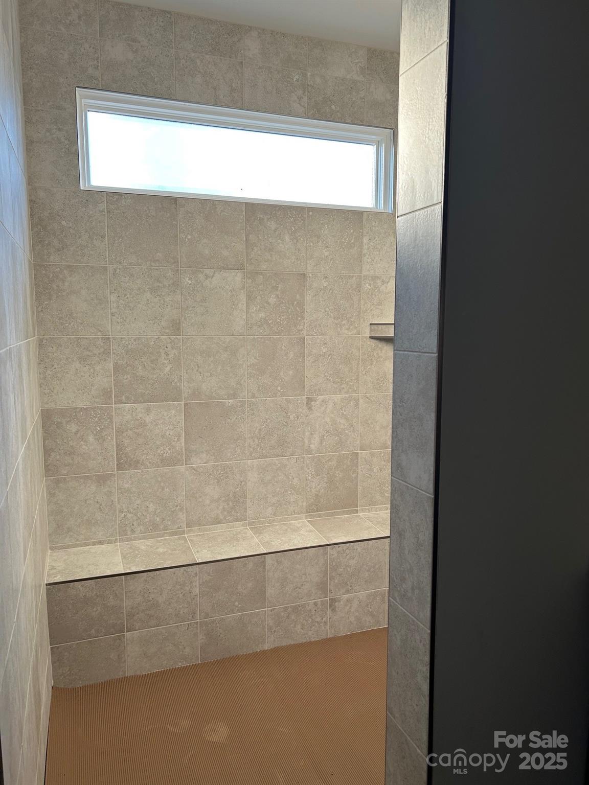 3048 Five Creek Road Charlotte, NC 28213 - Photo 10 of 12 a close view of a bathtub in bathroom