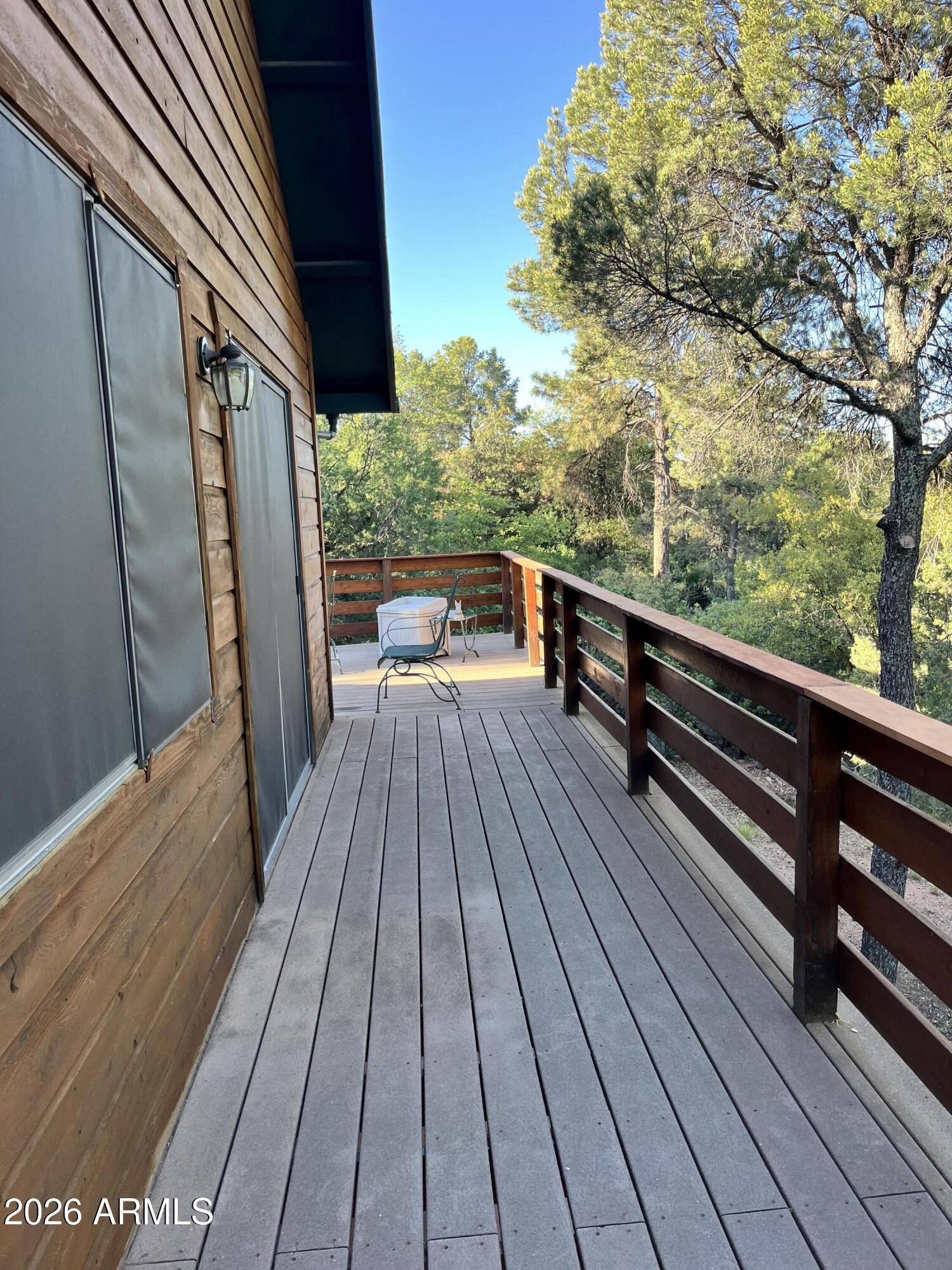 1006 North Matterhorn Road Payson, AZ 85541 - Photo 6 of 37 a view of balcony with wooden floor and outdoor seating