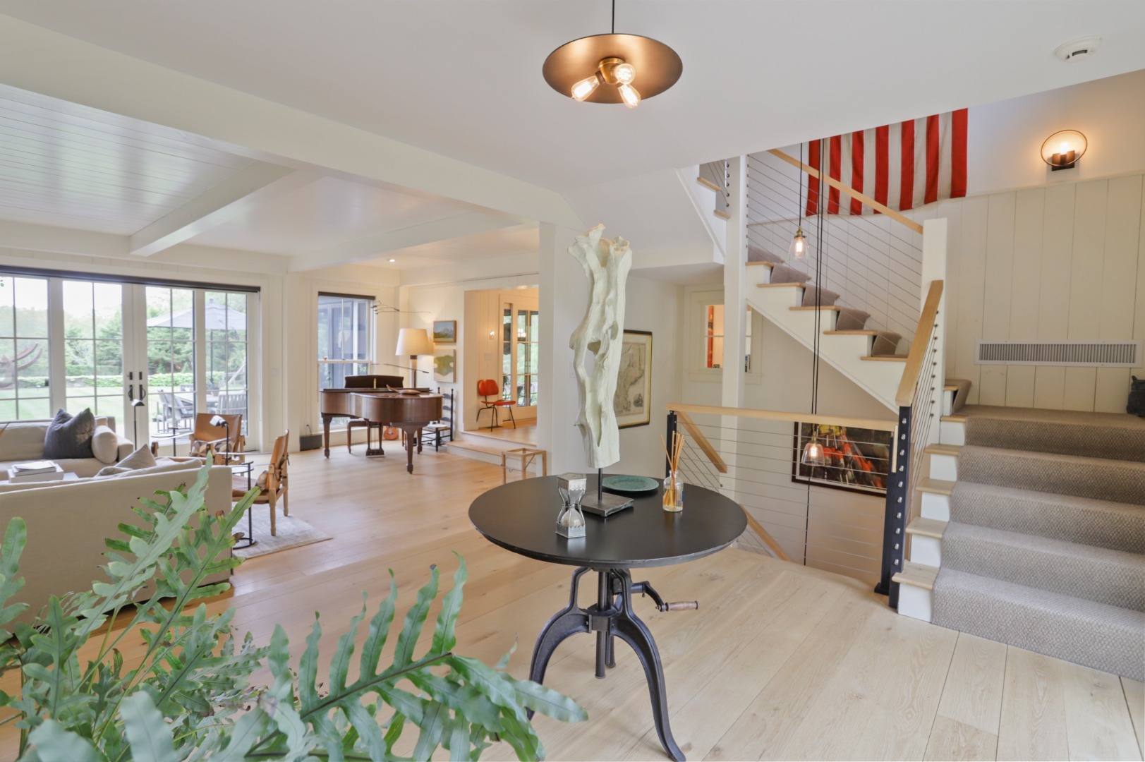 9 Ridge Hill Road Chilmark, MA 02535 - Photo 21 of 48 a living room with fireplace furniture and a large window