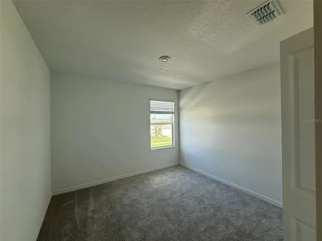 a view of empty room with window