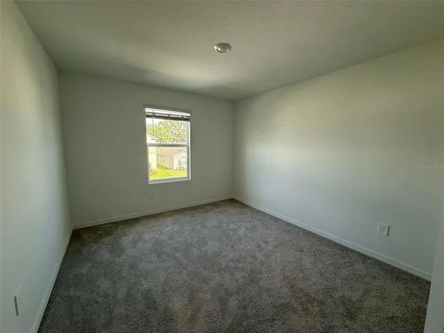 an empty room with window