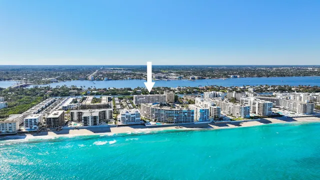 an aerial view of a house with a garden