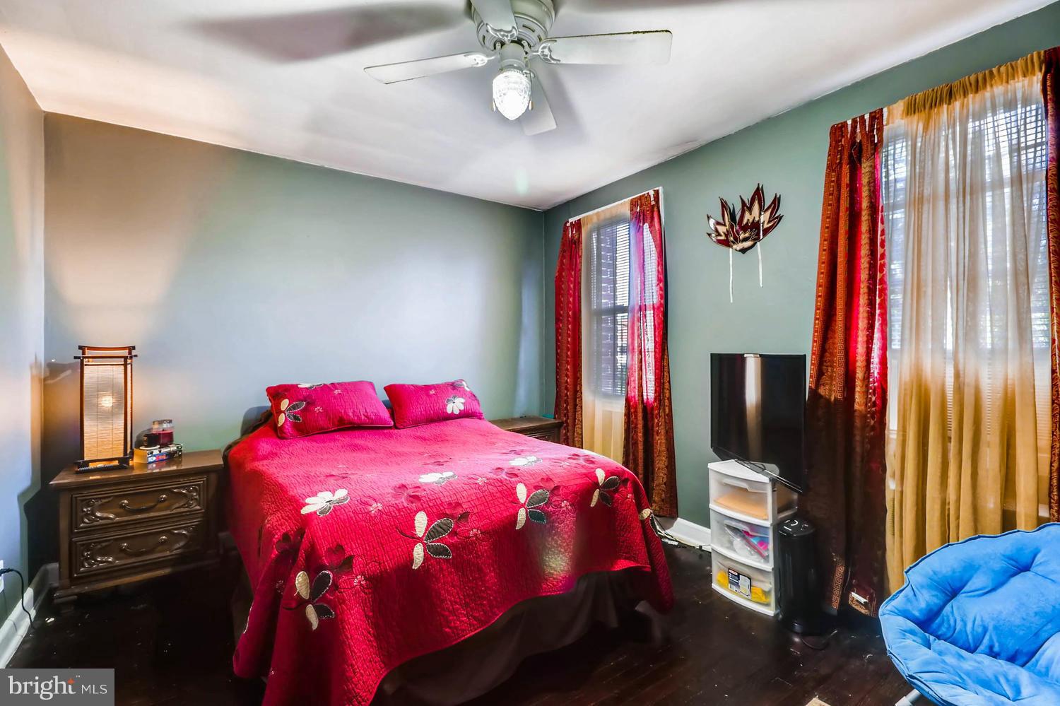 3703 Greenvale Road Baltimore, MD 21229 - Photo 17 of 24 a bedroom with a bed and a closet