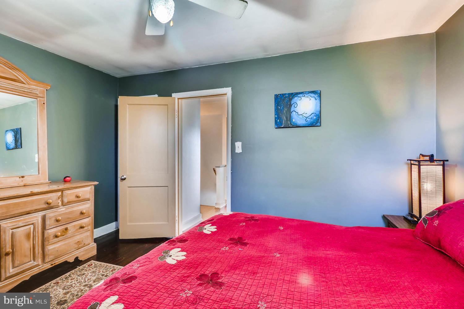 3703 Greenvale Road Baltimore, MD 21229 - Photo 18 of 24 a bedroom with a bed and a dresser