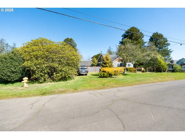 a view of a house with a big yard