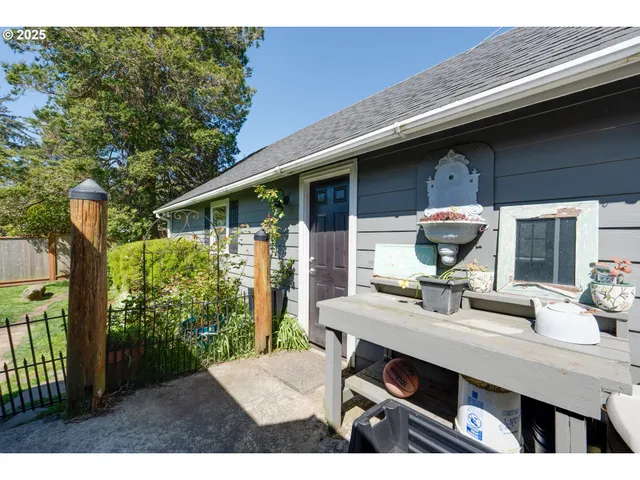 a view of house with outdoor seating area