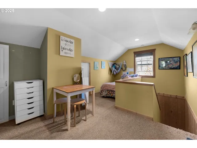 a workspace with furniture and window