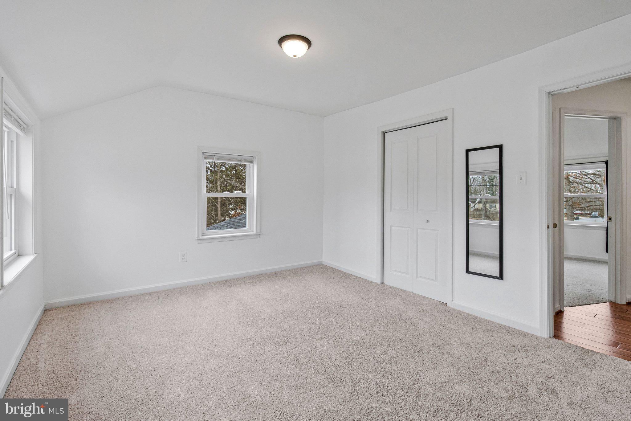 8600 Lantern Lane Clinton, MD 20735 - Photo 21 of 40 an empty room with windows and closet