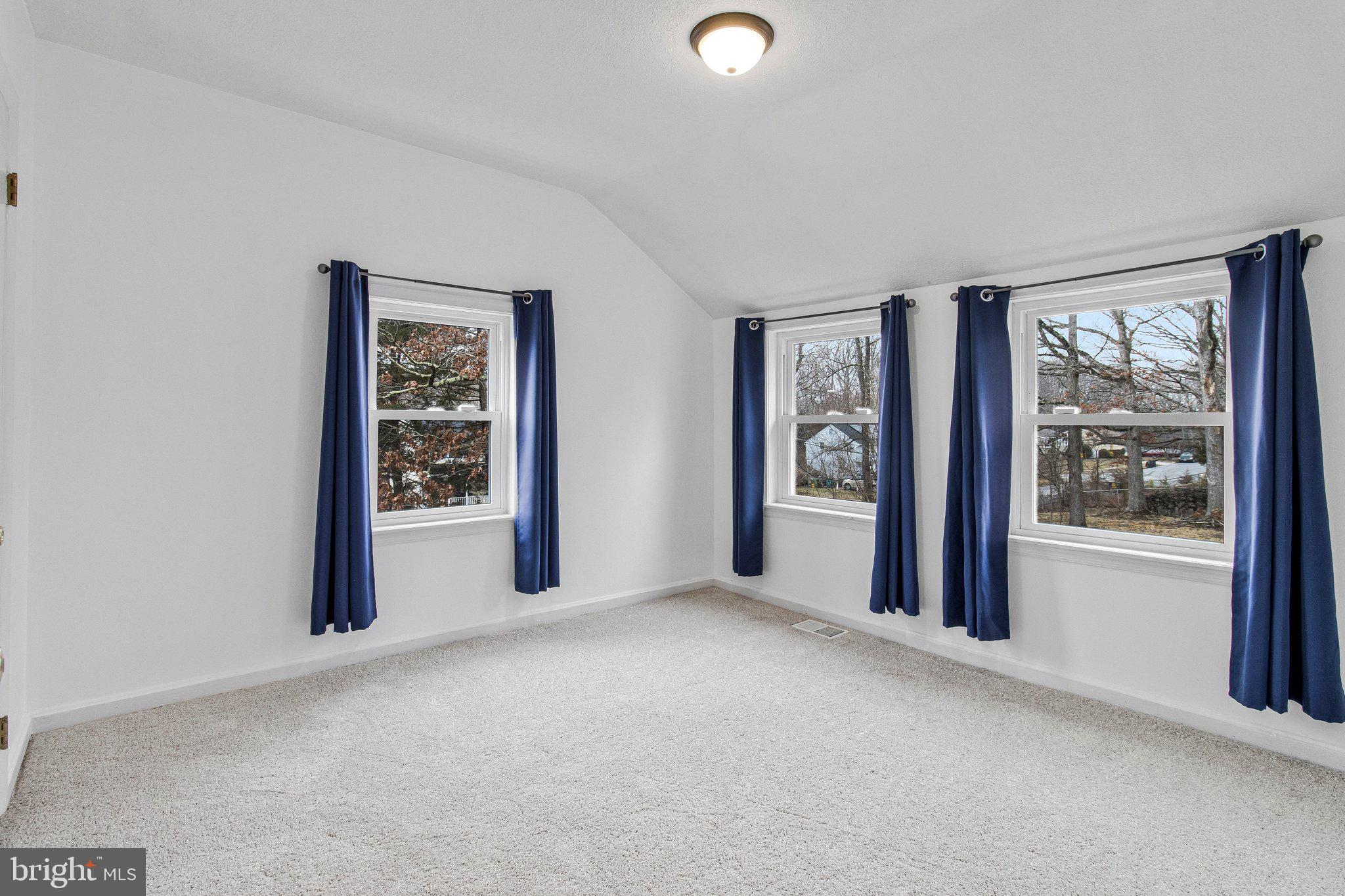 8600 Lantern Lane Clinton, MD 20735 - Photo 24 of 40 an empty room with windows and closet