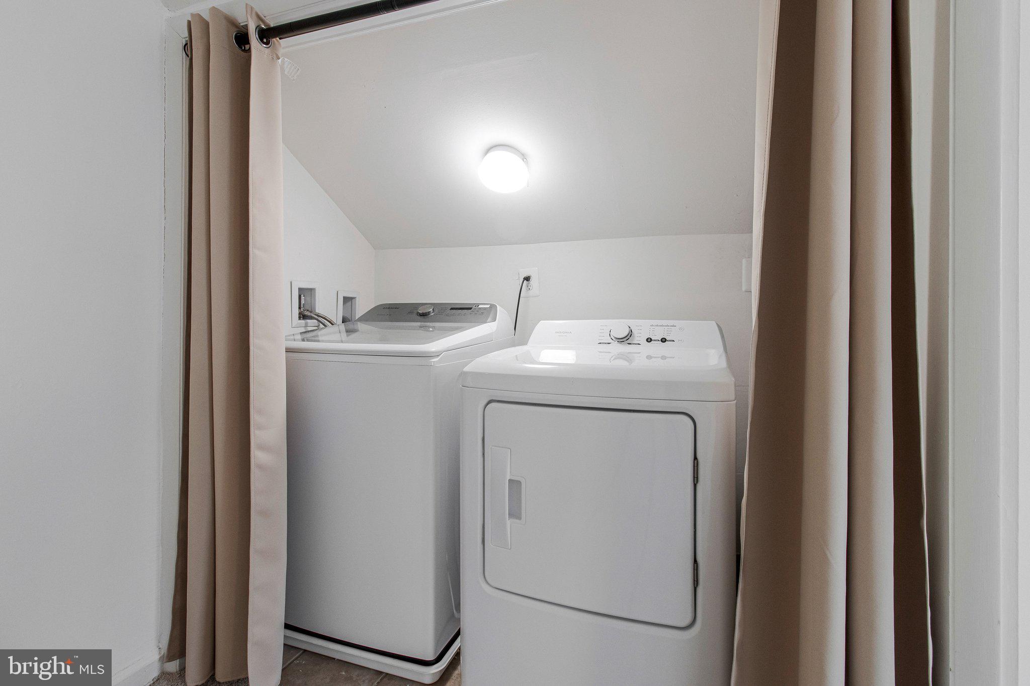 8600 Lantern Lane Clinton, MD 20735 - Photo 30 of 40 a utility room with dryer and washer