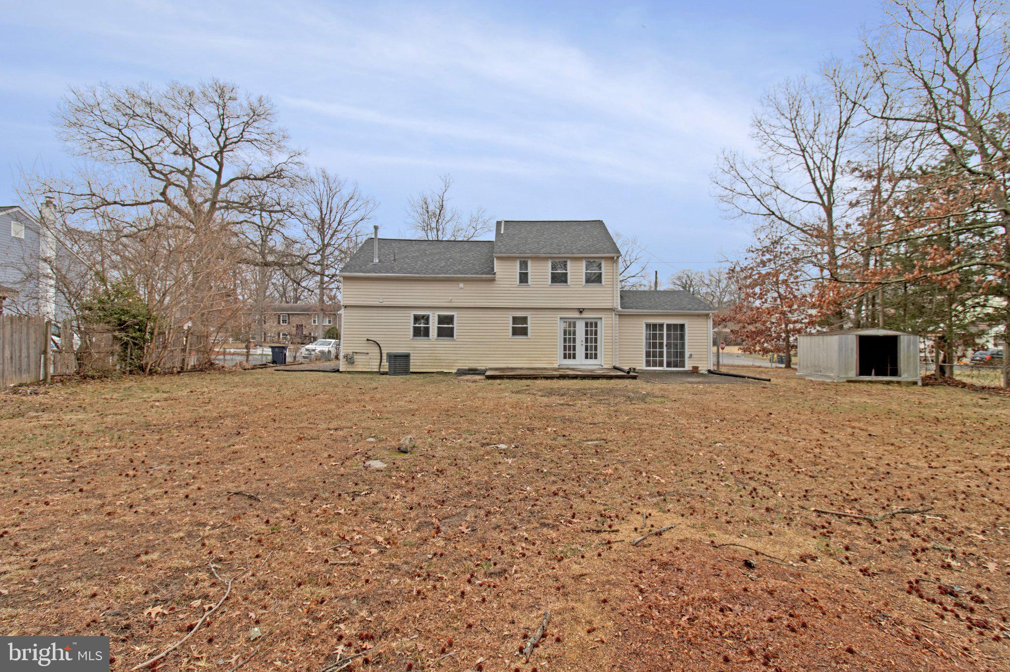 8600 Lantern Lane Clinton, MD 20735 - Photo 37 of 40 a front view of a house with a yard covered with snow