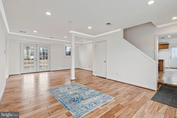 a view of a livingroom with wooden floor