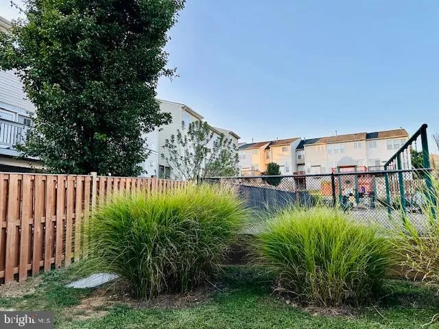 a view of a swimming pool and deck