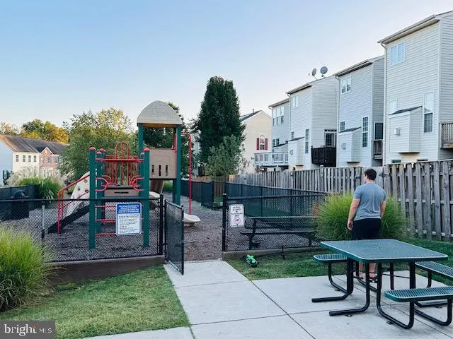 a view of outdoor dining space with a patio