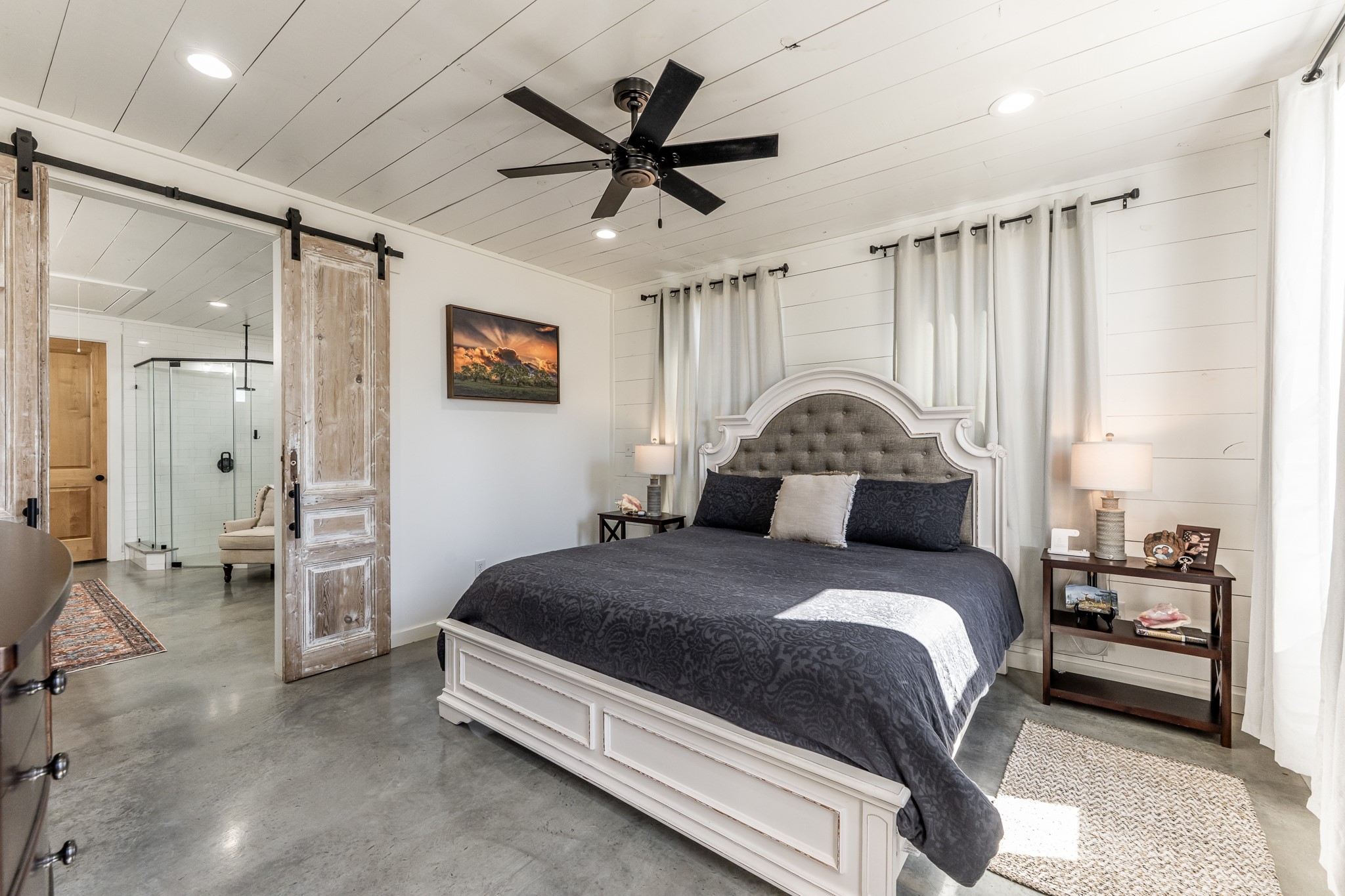 150 Bullyvard Livingston, TX 77351 - Photo 24 of 40 a bedroom with a bed and a ceiling fan