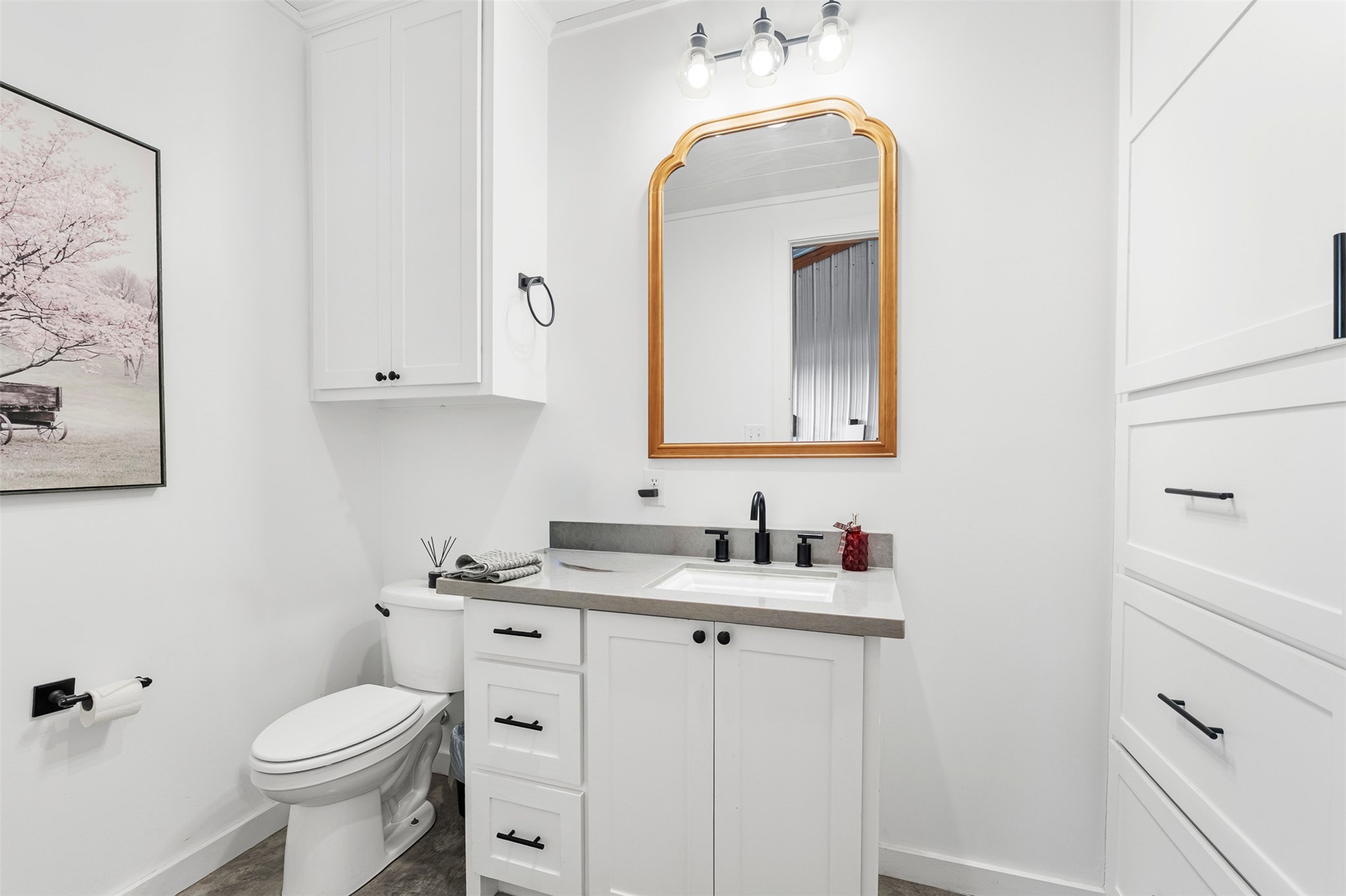 150 Bullyvard Livingston, TX 77351 - Photo 10 of 40 a bathroom with a toilet sink and mirror