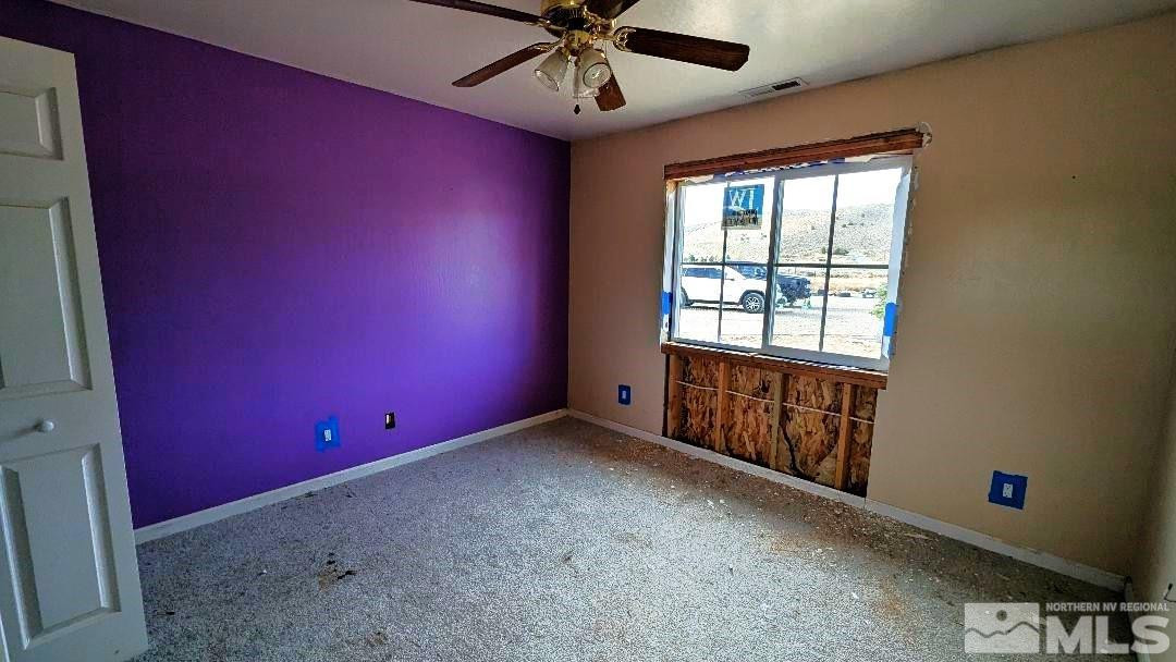1355 Antelope Valley Road Reno, NV 89506 - Photo 19 of 25 a view of an empty room with a window
