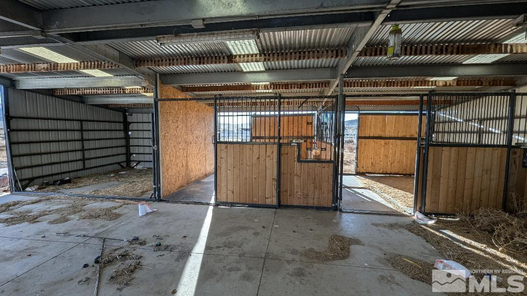 1355 Antelope Valley Road Reno, NV 89506 - Photo 24 of 25 a view of an empty room with wooden walls