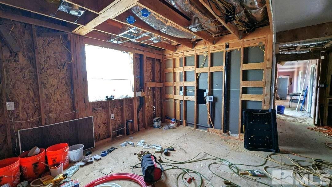 1355 Antelope Valley Road Reno, NV 89506 - Photo 10 of 25 a bed room with a bed and a window