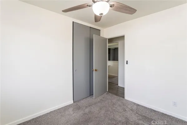 an empty room with a bathroom