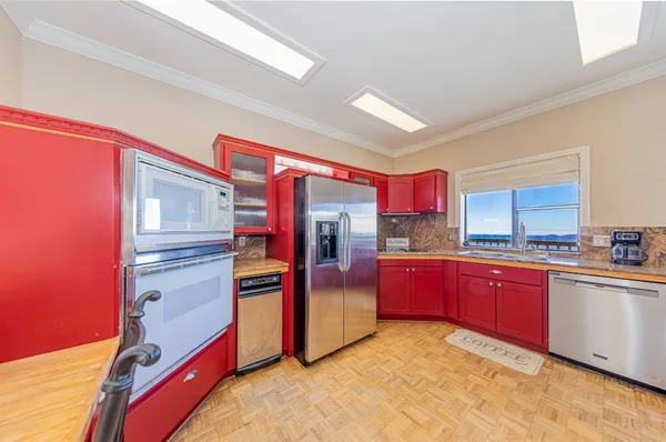 view of a bedroom with wooden floor and furniture