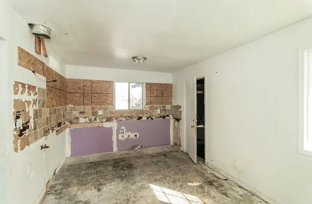 a view of a room with a window